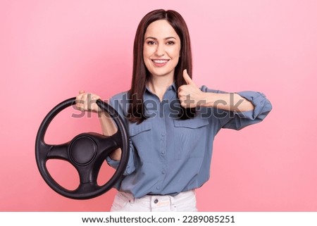 Photo of attractive charming lady wear stylish clothes demonstrate thump up enjoy quality vehicle isolated on pink color background