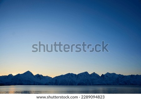 Mountains and fjords near fishing village of Henningsvær, Lofoten islands, Norway                      