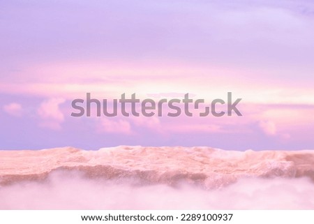 Stone podium tabletop floor in outdoor on sky pink gold pastel soft cloud blurred background.Beauty cosmetic product placement pedestal present promotion stand display,summer paradise dreamy concept. Royalty-Free Stock Photo #2289100937