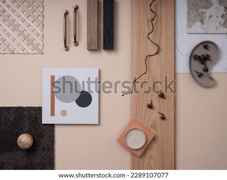 Aesthetic flat lay composition with textile and paint samples, handle, panels and cement tiles. Stylish interior designer moodboard. Light beige color palette. Copy space. Template. 