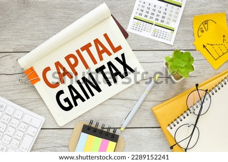 capital gains tax CGT. multicolored stickers and yellow notepad with notepad page with text