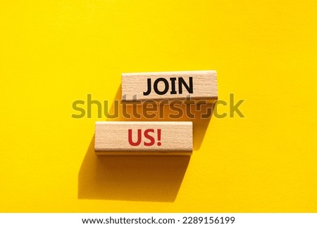 Join us symbol. Concept word Join us on wooden blocks. Beautiful yellow background. Business and Join us concept. Copy space