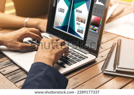Graphic designer software for modern design of web page and commercial ads showing on the computer screen Royalty-Free Stock Photo #2289177337