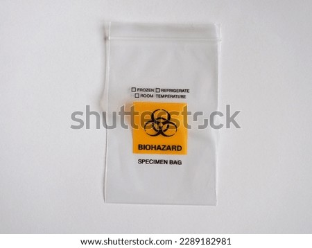 Biohazard specimen bag for disposal of covid test kit Royalty-Free Stock Photo #2289182981