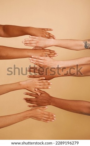 Hands of unrecognizable women with different skin colors Royalty-Free Stock Photo #2289196279