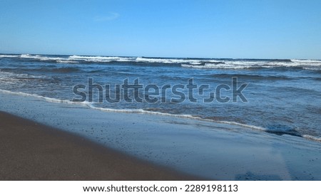 Photos of waves, seascape, port and ships.