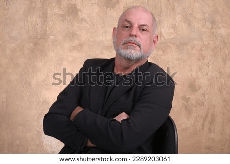 Senior social business handsome casual happy man smiling. Portrait of a middle aged adult, older casual happy smiling, mature aged man with gray hair