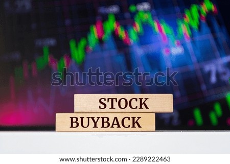 Wooden blocks with words 'Stock Buyback'. Business concept