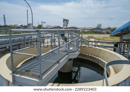 Waste water treatment plant for power plant project, lamella clarifier and sludge agitator. The photo is suitable to use for waste water treatment content media and environment poster. Royalty-Free Stock Photo #2289223403