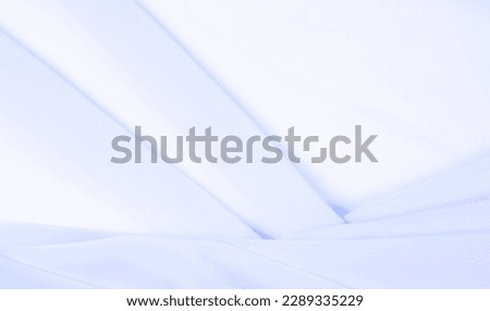 seamless background texture - pale blue silk. Let the nuances of this simple yet sophisticated fabric speak for themselves. Soft, grainy texture, slightly shiny blue color Royalty-Free Stock Photo #2289335229