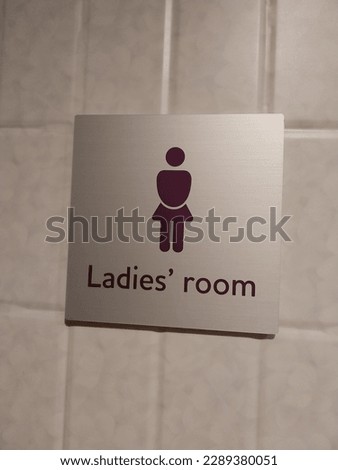 Pattern of toilet sign on wall in Japan