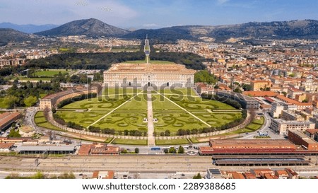 Aerial view of the Royal Palace of Caserta also known as Reggia di Caserta. It is a former royal residence with large gardens in Caserta, near Naples, Italy. It is the main facade of the building. Royalty-Free Stock Photo #2289388685