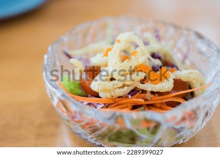 Shirauo Salad or Silverfish Salad in a bowl. Selcetive focus.