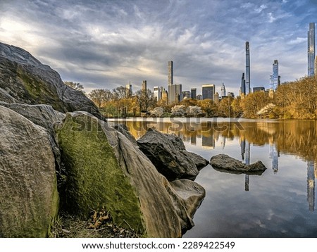 At he lake in Central Park, New York City, Manhattan, in early spring, morning with cloudy sky