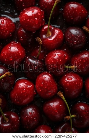a lot of red ripe cherries close up with water drops Royalty-Free Stock Photo #2289425277
