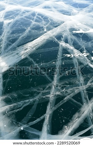 melting and cracked amazing ice of Lake Baikal