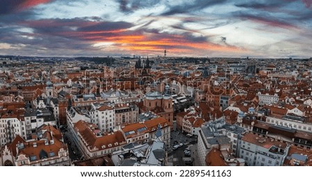 Panoramic aerial view of old Town square in Prague on a beautiful summer day, Czech Republic. Church of our Lady before Tyn and Prague Astronomical Clock Tower