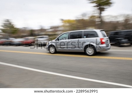 paying picture of cars passing by 