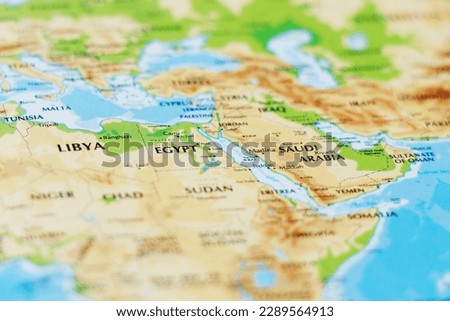 close up of a world map with african asian side, egypt and saudi arabia in focus Royalty-Free Stock Photo #2289564913