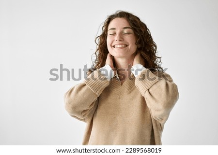 Young adult smiling positive woman model, joyful pretty cheerful cute curly girl student laughing having fun feeling happy healthy standing isolated at white background, authentic candid studio shot.