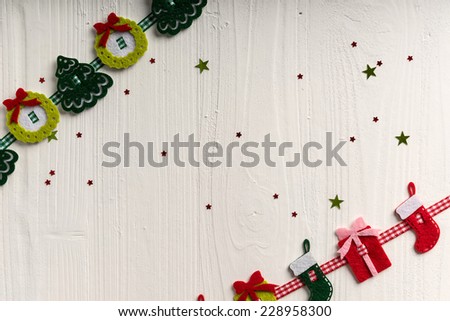 Christmas decoration on a background of white painted rustic boards with copyspace