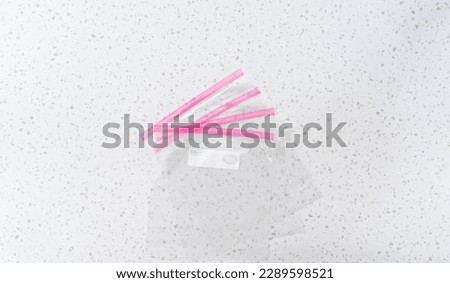 Flat lay. Empty plastic bags to package homemade frozen shrimp scampi meal prep. Royalty-Free Stock Photo #2289598521