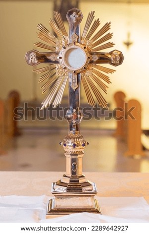 Hobart, Tasmania, Australia, May 14, 2015: Detail of a Monstrance, also called a Ostensorium in which the consecrated eucharistic host is held, on the altar of St Marys cathedral