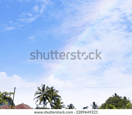 beautiful rainbow and blue sky