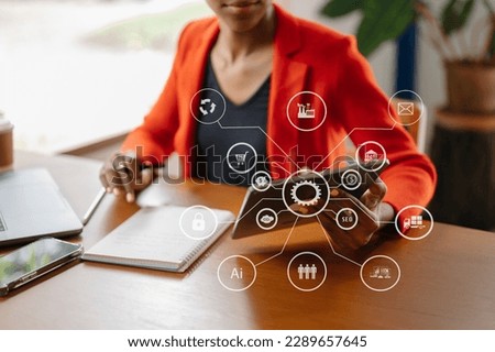  Businesswoman working with smart phone and laptop and digital tablet computer in office with digital marketing media in virtual icon
 Royalty-Free Stock Photo #2289657645
