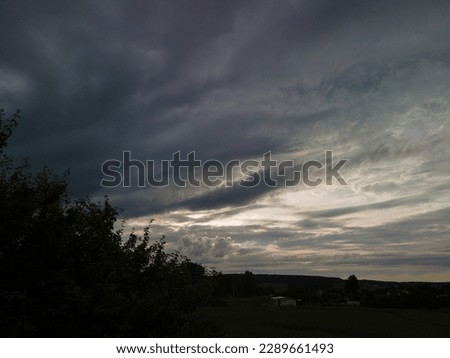 Dark gray clouds in the sky, evening sky