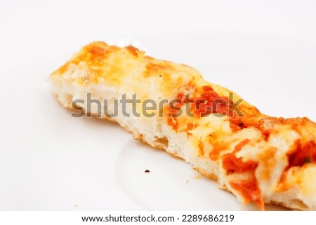 Leftover pizza crust that some people may not eat 