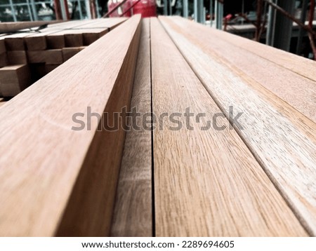 Elongated rectangular wood pile for interior industrial processing 