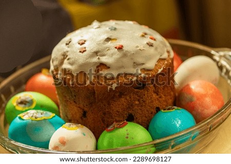 Easter cake and chicken eggs of different colors. Photo taken in Chelyabinsk, Russia.