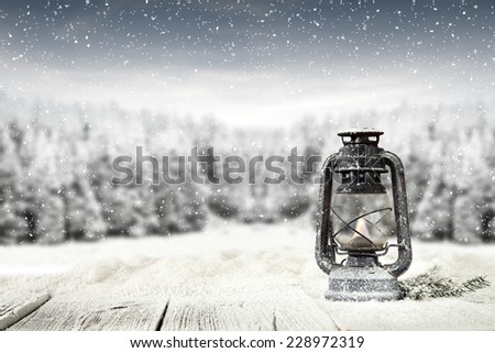 desk of free space and white snow with lamp of blue 