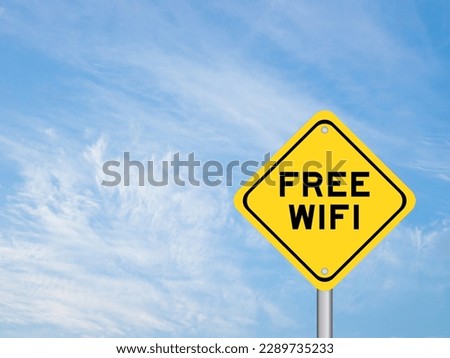 Yellow transportation sign with word free wifi on blue color sky background