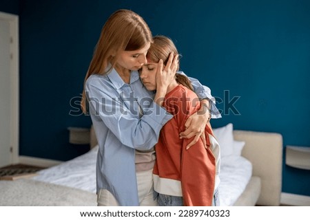 Loving supportive mother hugging upset teen girl daughter, woman supporting mom child in difficult times, showing empathy and understanding to kid teenager. Trust in parent-child relationship