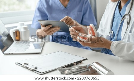 Team of doctors and dentists talking and working health care talk medical conference concept online consultant Royalty-Free Stock Photo #2289763655