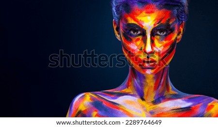 Woman in color body painting on her face. Horizontal banner. Cover art for your mixtape, video, song or podcast. Bodyart design for book covers.