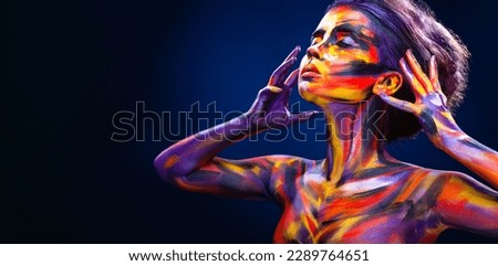 Woman in color body painting on her face. Horizontal banner. Cover art for your mixtape, video, song or podcast. Bodyart design for book covers.