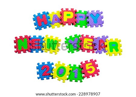 Happy New Year 2015 words made of alphabet puzzle isolated on white