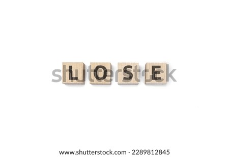 lose word on wooden cubes on white background