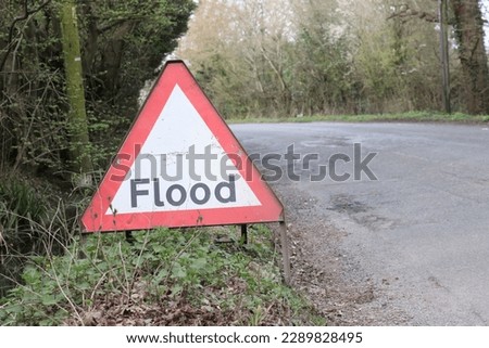 Close up image of sign board written flood