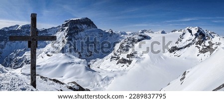 View from the Gemsfairenstock summit above the Claridenfirn Glacier. With summit cross. ski mountaineering. High quality photo