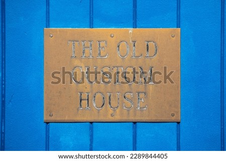 Plaque on the doorway to The Old Custom House in Leigh-on-Sea in Essex, UK.