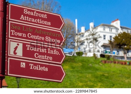 Signposts showing the directions to local tourist attractions in the city of Southend-on-Sea in Essex, UK. Royalty-Free Stock Photo #2289847845