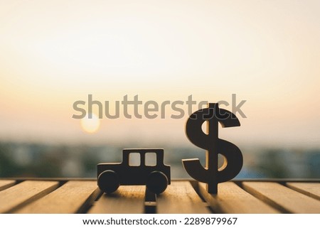 Wooden car model, Dollar symbol with sunlight, Concepts, a symbol for buying a new car, vehicle car auto repair service maintenance.