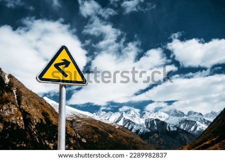 Traffic sign on the high mountain road in western Sichuan, China