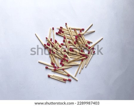 A lot of matchstick with read phosphorus with white background Royalty-Free Stock Photo #2289987403