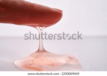 The texture of a pink viscous cosmetic product. Royalty-Free Stock Photo #2290009049