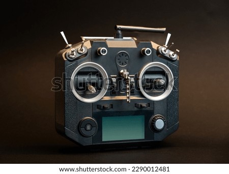 done radio controller on dark background  Royalty-Free Stock Photo #2290012481